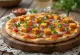 Kúsky Paneer Tikka Pizze s korenistým paneerom a syrmi